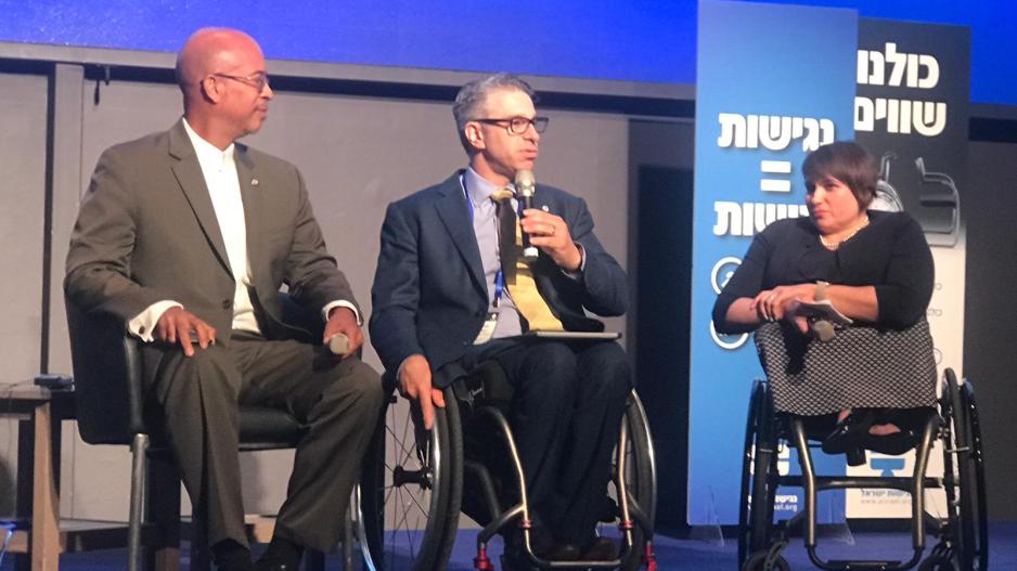 Access Israel conference with stage and audience