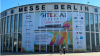 Das Eingangsgelände der Messe Berlin mit dem großen Banner der GITEX AI Europe 2026.